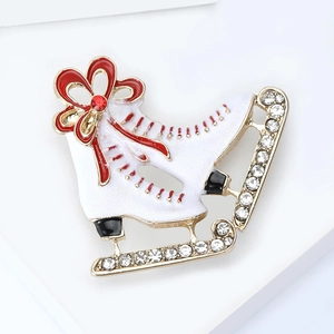 Exquisite enamel ice skate brooch with red ribbon bow and rhinestones in gold finish