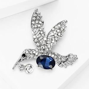 Eleganter Kolibri-Anstecknadel mit blauem Edelstein und weißen Kristallen auf Silberbasis