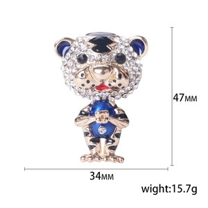 Cute tiger brooch pin in gold alloy with white crystals and enamel detailing for women