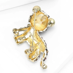 Goldene Tiger-Brosche mit funkelnden lila Strasssteinen und sicherem Verschluss