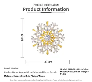 Detail showing rotating silver snowflake brooch dimensions 40mm x 37mm with zircon stones