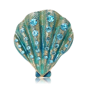 Elegant vintage shell brooch with blue rhinestones and teal enamel for suits