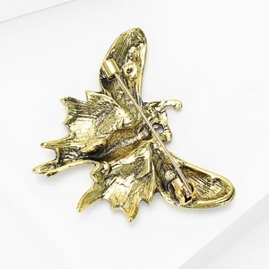 Fashionable butterfly brooch in vintage gold alloy with secure pin clasp back view