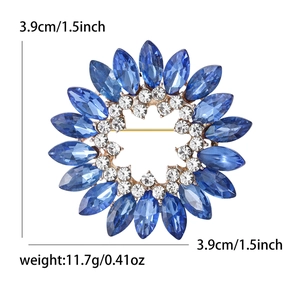 Broche fleur en cristal bleu avec strass et base dorée, taille 3,9 cm