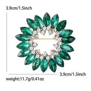 Élégante broche tournesol vert émeraude avec finition dorée pour gilets de femme