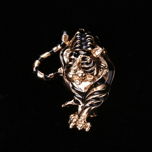 Golden tiger brooch with black enamel stripes in a dynamic pouncing pose for men and women