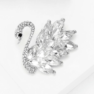 Macro detail of swan brooch with silver metal base and inlaid marquise zircons