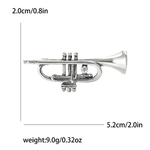 Detailed macro view showing the flute brooch dimensions and crystal inlay detail