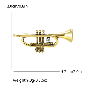 Vintage gold flute brooch with rhinestone detail, measuring 5.2cm x 2.0cm for suit lapels