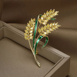 Golden wheat ear brooch with sparkling yellow zircon and green enamel accents