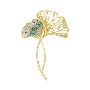 Exquisite golden ginkgo leaf brooch with green and white micro-set cubic zirconia stones
