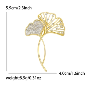 Ginkgo leaf brooch with pavé zircons in gold finish including size and weight specs