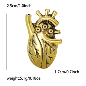 Golden anatomical heart brooch in alloy enamel with vintage finish and specific sizing
