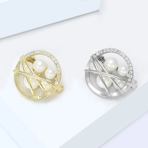 Elegant gold and silver round pearl brooches with micro-set zircons on geometric pedestal