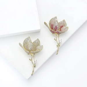Elegant gold tulip brooch with micro-pave cubic zirconia and vibrant floral details