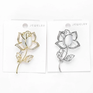 Détails de broches roses dorées et argentées avec pierre œil de chat et zircone cubique