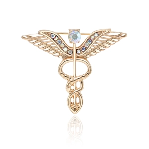 Vintage gold caduceus brooch with colorful rhinestones and angel wings for suits
