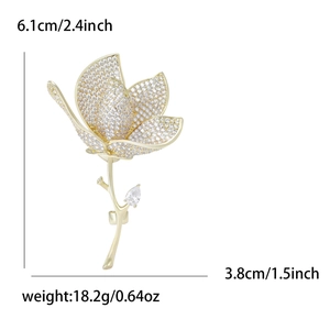 Elegant gold tulip brooch with white cubic zirconia and size measurements displayed