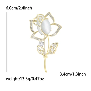 Élégante broche rose dorée avec pierre œil de chat et incrustation de zircon