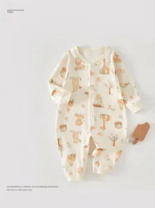 Detail view of baby romper featuring soft animal print fabric and snap button closure