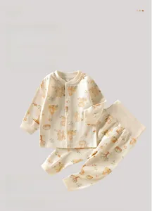 Detail of newborn high waist loungewear set with cartoon bear print and ribbed cotton fabric
