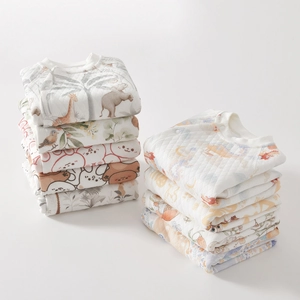 Quilted newborn rompers with animal prints and diamond stitching for winter warmth