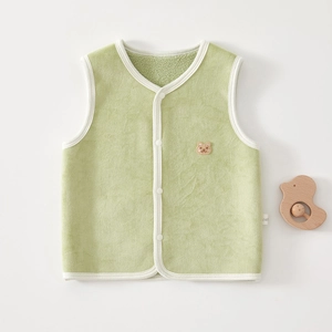 Detail of baby warm fleece vest in sage green with cute bear embroidery and snap buttons