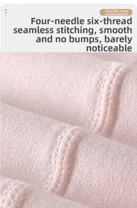 Close-up of four-needle six-thread flat seam on soft pink cotton baby bodysuit