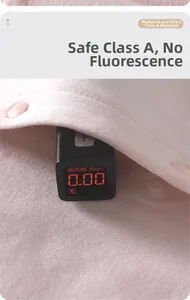 Detail shot of infant cotton bodysuit fabric being tested for zero fluorescence safety