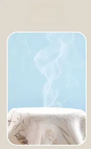 Breathable cotton baby romper fabric demonstrating air permeability with steam