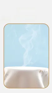 Detail showing the breathable cotton fabric with visible steam demonstration for babies