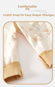 Detail view of bamboo print baby romper with ribbed cuffs and convenient crotch snaps
