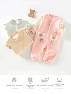 Detailed view of baby thermal jumpsuits in soft fleece with sunflower pockets
