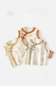 Detailed view of baby cotton vests with traditional Chinese frog button and bamboo prints