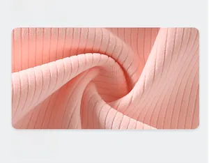 Close-up of pink ribbed knit fabric showing warmth-locking texture for baby clothing