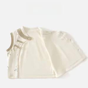 Detail of warm infant vest with bamboo pattern and traditional Chinese style knot