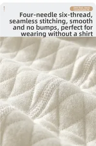 Close-up of flatlock stitching and quilted fabric texture on baby romper inner lining