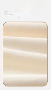 Macro detail of soft, breathable beige cotton knit fabric for newborn thermal vests