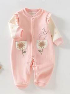 Pink and white long-sleeve baby romper with rabbit embroidery and ruffled shoulders