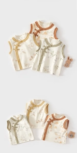 Detailed view of baby vests with traditional Chinese knot buttons and bamboo patterns