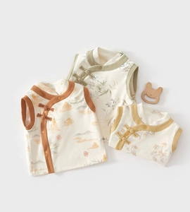 Detail of baby thermal vests with traditional Chinese patterns and classic frog buttons