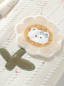 Thick waffle knit baby girl cardigan in cream with floral bear applique and pink embroidery