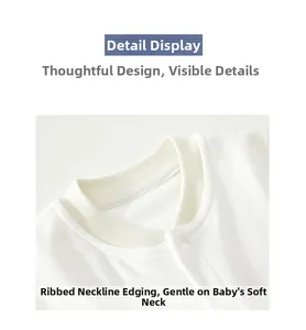 Detail of newborn cotton bodysuit with ribbed neckline and white snap button closure