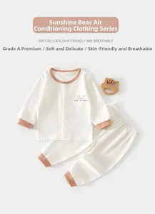 Detail of baby summer loungewear set with soft waffle fabric and bear pattern