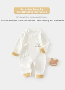 Détail du tissu gaufré en coton respirant de classe A pour pyjama d'été nouveau-né