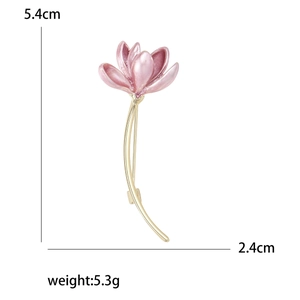 Elegant magnolia flower brooch with pink petals and gold stems, sized 5.4cm by 2.4cm