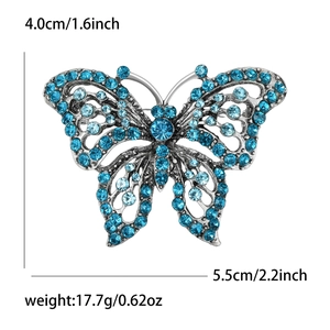Detail view of rhinestone butterfly brooch with dimensions 5.5cm width and 4.0cm height