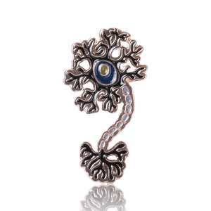 Detailed view of neuron-shaped brooch with black enamel and gold-plated edges