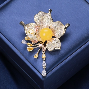 Exquisite flower brooch with yellow amber stone and sparkling zircon tassels on navy blue box