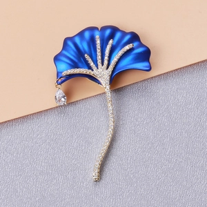 Detail of ginkgo leaf brooch with blue enamel and micro-set zircon crystals